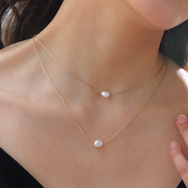 ✨ Choker Dupla em Aço Inoxidável 316L com Pérolas Naturais – Sofisticação e Modernidade