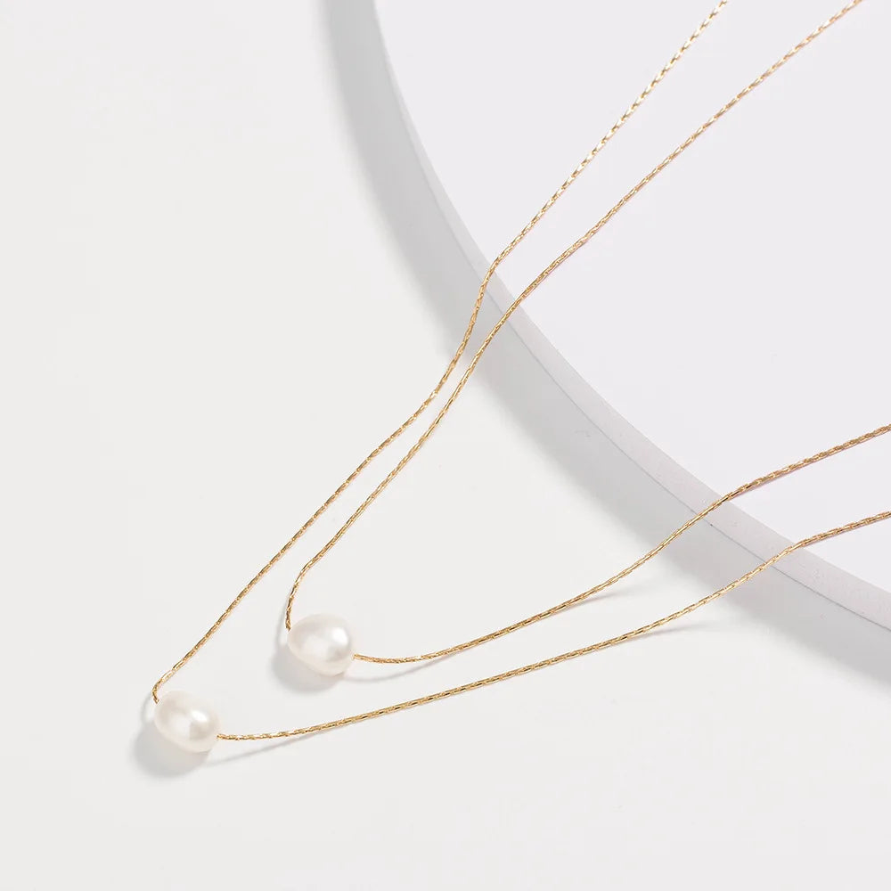 ✨ Choker Dupla em Aço Inoxidável 316L com Pérolas Naturais – Sofisticação e Modernidade
