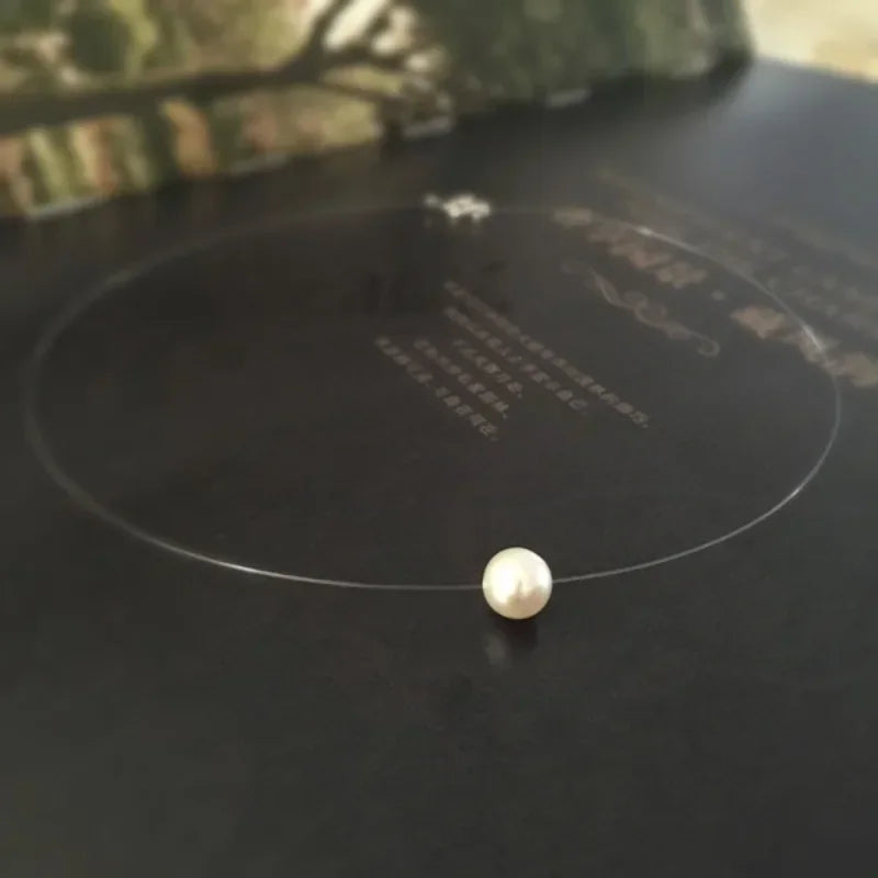 đź’Ž Choker InvisĂvel com PĂ©rola – Delicadeza e Sofisticação Minimalista