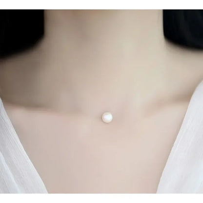 💎 Choker Invisível com Pérola – Delicadeza e Sofisticação Minimalista